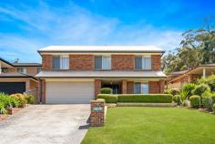  7 Stringybark Cl Terrigal NSW 2260 Advantaged by a highly prized location in one of Terrigal’s most established and sought-after neighbourhoods, is this expansive family residence. Impeccably presented and offering an irresistible blend of elegance and contemporary style. Enhanced by generous living domains, gourmet kitchen, landscaped gardens and superb outdoor entertaining. This home provides the perfect family lifestyle! – Immaculately presented family home, sun-drenched 628sqm allotment. – Updated interiors including flooring, paint and blinds throughout. – Neutral colour palette; elegant contemporary style, new ducted air conditioning. – Gourmet kitchen with stone counters, Smeg appliances, gas cooking. – Large open plan living and dining, additional oversized causal living. – Master bedroom with ensuite and walk in robe, air conditioned. – Three additional spacious bedrooms, all with ceiling fans and robes. – Superb built-in study/office area, ideal for working from home or kids. – Large undercover entertaining area, fully fenced yard perfect for kids and pets. – Large double lock up garage with room for storage or work bench. – Superbly designed with storage throughout including under house. With a north facing backyard and located in a friendly cul-de-sac street, this home truly has it all, including being only moments to a variety of sought-after schools, the popular Erina Fair shopping precinct, public transport and minutes to an array of pristine beach!  
