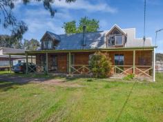 77 Clarendon St Baddaginnie VIC 3670 $350,000 Cute red cedar cottage situated on 2041m2 block in picturesque Baddaginnie, just 12km out of Benalla. Cathedral timber ceilings with exposed beams, create a spacious feel, in this open plan residence, with galley kitchen, breakfast bar and walk-in pantry. The master bedroom and family bathroom are located on the ground floor and another two bedrooms are upstairs, each with their own dormitory window. There is a spacious lounge room with a cozy wood heater along with a modern split system air conditioner. There is a beautiful aspect to the front of the property, that can be enjoyed from the veranda. There is ample room for a large shed. 