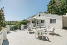  32 Auld St Terrigal NSW 2260 Set in one of the coast's most sought-after areas, this beautifully renovated home offers flexible scope to accommodate growing families. It's located just 500m to Terrigal Beach, Cafes, popular eateries and local schools. - Spacious layout features separate living and dining zones - Cosmetically updated new carpet, flooring and painted throughout  - New open plan kitchen has stone island bench and stainless steel appliances plus natural gas - Generously sized bedrooms, all fitted with built-in wardrobes and separate r/c air conditioners - Light filled master reveals ensuite and large walk-in robe - Exceptional outdoor flow to the sun washed entertaining area with newly laid travertine tiling. - Ample storage, double garage with off street parking - Established gardens, auto double garage, a low maintenance block with BBQ Juliet balcony - Easily accessible to Erina Fair, about 90 minutes from Sydney 