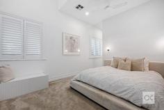  18 Scott Street Dulwich SA 5065 $3,990,000 A project two years’ in the making and worth the wait in every way, what was a weary C1900 character villa is today nothing short of a brand new two-level family home that gets more searingly stylish with every step towards its magnificent open-plan, crowd-pleasing crescendo. Stripped right back to its bare bones; not a stone was unturned, nor was an expense spared, recasting and architecturally extending this 6-star-energy-rated 6-bedroom home that will charge your electric cars in 18 minutes and make summers a dream. You aren’t dreaming. Every inch of that Jag kitchen – with curved joinery, an entire suite of Smeg’s latest and greatest appliances and a butler’s pantry – is real. And the undoubted star at the head of an open-plan arena designed to light-drenched perfection by D’Andrea Architects. The louvred pavilion – featuring a striking black outdoor kitchen – and the fully-tiled mineral pool are a formidable combination – lighting the fuse to entertain in style, coming to life at night. The carefully placed mood lighting is symptomatic of a solar powered home that considers every last little detail; from the oak chevron flooring at your feet to the soaring voids above and the custom joinery, marble finishes and high-tech comfort that features in between. The lap of luxury starts the moment you step foot on the underfloor heated ensuite of a master wing with sky-lit raked ceilings, window seat and a walk-in robe. And a walk is all that stands between this special home and the boundless Victoria Park, Rose Park Primary School and the CBD’s electric East End. The wait is over. This is the one. – Painstakingly renovated, internally and externally – included underpinning and completely new plumbing, wiring, roofing, landscaping and more – Supremely flexible with scope to make bedrooms into living zones – Powerful 21KW solar system and provisions for Tesla battery – Electronic gated entry and video security – Zoned ducted heating and cooling and feature stone fireplace – Jag kitchen includes butler’s pantry, two integrated fridges/freezers, Dolomite marble benchtops, pyrolytic oven, steam oven, oven/microwave, blast chiller, Sous-vide drawer and coffee machine – Double undercover parking with electric car charging station, plus further off-street parking – Outdoor kitchen with Dekton stone benchtops, 6-burner BBQ, Bottega stone feature wall and travertine crazy paving – Rain sensored louvre to alfresco pavilion – Upper level bedrooms share an ensuite, and generous double walk in robes – Three bathrooms and one powder room – Finishes include Calacatta Viola Marble and Fibonacci terrazzo tiling to wet areas – Study nook to upper level – TV and data points to every bedroom and alfresco pavilion – Fully landscaped gardens with auto watering/irrigation and ambient lighting – Outdoor (hot/cold) shower – Three-phase power – Sonos surround sound speakers throughout living, dining, alfresco and pool areas – Zoned for Rose Park Primary School and Marryatville High School with a host of prestigious colleges just minutes away 