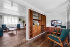  14 Bateman St Geebung QLD 4034 $750,000 Coming to the market for the first time since it was built in the 60s is this much-loved family home in Geebung. There’s no question this home has seen better days, but you can’t beat this elevated position in a quiet, leafy street close to amenities. Surprisingly spacious, the home comprises four bedrooms with built-in robes, a study, an updated bathroom with a separate shower and bath and separate toilet, laundry room, a living room, family area, and a kitchen and meals area. Full of charm and character of its era, the home features timber floorboards and built-in timber storage – a great foundation for a gorgeous Hampton’s-style or mid-century modern makeover. A full building and pest inspection has been conducted, so there are no surprises for the buyer. Additional highlights include a single carport with drive-through access to the yard, electric cooking, and electric hot water. Situated on a generous 612m2 (approx.) block, there’s lots of yard space, both front and back for the kids to play, to put in a pool, extend the home, or build the home of your dreams. Established trees and gardens provide plenty of shade and could be the backdrop of a private family oasis. This is a great family-friendly location, with a selection of primary and early learning schools all a short walk away as well as parks, sports fields, and the Downfall Creek Bikeway. Geebung and Sunshine train stations are also within walking distance for hassle-free commuting to the CBD (approx. 15 km away). Westfield Chermside is a five-minute drive for all your shopping and entertainment needs. There’s a good reason the owners have held onto this home for over sixty years – don’t miss your chance to secure this property. Call us today to make an offer. Contact us to arrange your very own private inspection today. Open 7 days Phone 07 3203 6001 (24 Hours) OUR FAVOURITE FEATURES : • Long-held family home on 612m2 elevated block • Great Geebung location, close to all amenities • 4 beds with BIR + 1 study +1 bath + separate WC • Living area + kitchen & meals + separate family • Updated bathroom, electric cooking & hot water • A full building and pest inspection has been done • Carport with drive-through access + laundry room • Large, fenced yard, established trees & gardens • Walk to schools, childcare, parks, sports, bike path • Walk to train station; Brisbane CBD 15 km away • 5-min drive to Westfield Chermside; walk to dining • Fantastic family-friendly location, lots of potential 