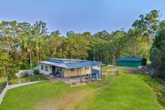  431 Blackall Range Rd West Woombye QLD 4559 Perfectly positioned on the most elevated point of its 6133m2 block to maximise northerly outlook, privacy, natural light, and breezes – is this single level brick home, offering a gentle small-acreage lifestyle amongst the lush, verdant countryside of the lower hills of the Blackall Range. The home itself comprises three bedrooms, one bathroom, separate toilet, combined living and dining plus sunroom, central kitchen, double carport/outdoor entertaining area with built-in BBQ, and separate laundry; there is also a cosy north-east facing balcony off the master bedroom. Whilst a little tired inside with clear potential to update and refresh to suit personal tastes as well as value-add; the home has good bones and is not without charm. Existing features include hardwood floors throughout, decorative fretwork in living/dining doorway, ceiling fans, security screen doors, electric upright oven and stove, and the area immediately around the house is fenced for child and pet-friendly play. In addition, there are 2 x 3-bay sheds on site, one with power – providing extra space for storage, workshop purposes, and parking of vehicles. The soil is rich and fertile – suitable for growing a variety of crops, so could suit hobby farmer, and is low maintenance in its current state, just needing a regular mow/slash. One of the truly appealing things about this property is its position – it is tucked well away from the Blackall Range Road, at the very end of a private laneway at the top of the hill; with very few neighbours it is quiet and peaceful. Whether you purchase the home to live in as is, renovate, or even rebuild – you will not have to worry about overcapitalising; the location is top! Despite its privacy and serenity, it is a pleasant 8-minute drive to the village of Woombye, 12 minutes to Nambour, and 25 minutes to the coast; public and private schools are within a 10-15 minute proximity, and it's only 10 minutes up to Flaxton on top of the Blackall Range. Vacant and ready to move straight into – buyers in the small-acreage market are urged to take a serious look at not just what this is right now, but what it could be. Privately positioned north facing home on 1.5 acres Tucked away on hilltop at end of quiet laneway 3 bedrooms + study + sunroom, 1 bathroom Combined living and dining area Functional kitchen with electric oven & cooktop Double carport/outdoor patio with built-in BBQ Delightful views of the Blackall Range to savour 2 x 3-bay sheds (one powered), fencing around home Potential to renovate/extend or rebuild (stca) Less than 10 mins to village amenities & rail 