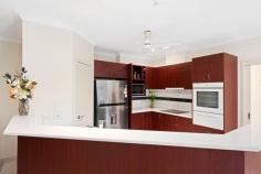  26 Jolly St Woolner NT 0820 $590,000 Filled with light, this vibrant property provides an idyllic home of contemporary comfort, space, and ease of living. Stylish design features, multiple indoor and outdoor living options, along with abundant natural light, this is the perfect opportunity to pivot into a low maintenance lifestyle without compromising on luxury only 5 minutes from Darwin CBD. - Interior boasts high ceilings, modern down-lights and polished tile floors - Quality four-bedroom home in a premium location - Good-sized open-plan living and dining area - Well maintained kitchen with dishwasher - Covered back patio entertaining area overlooks established gardens - Four large carpeted bedrooms, master with ensuite - Tiled floors, air-conditioning and ceiling fans throughout - Undercover parking for two vehicles - Located with neighbouring properties, at the end of a cul-de-sac - Short distance to all amenities The large open-plan living/dining area is the first thing that greets visitors upon entry, showing off the modern interior to great effect. Polished floor tiles, modern downlights and large windows all add to the feeling of space. The well-maintained kitchen nearby is as neat as they come, and is equipped with stainless steel appliances, walk-in pantry, plus ample overhead and under-bench storage. All four bedrooms are of a good size. The king-sized master bedroom comes with walk-in wardrobe, plus ensuite with raised glass vanity basin and indoor-outdoor shower for both wet and dry season. The main bathroom is similarly fitted and has a large vanity basin and glass-screen shower-over bath, with modern wall tiles. Outside, the sheltered rear patio area overlooks a cosy backyard and wellestablished gardens. This good-sized area requires minimal maintenance and provides ample room for entertaining guests. The large double carport at the front provides parking space for two large vehicles, while the nearby storeroom providing plenty of storage space. Additional features include ceiling fans, split-system air conditioning and modern downlights throughout, plus a spacious internal laundry. Conveniently located near, shops, parks, Parap markets and the CBD all within an easy drive. With so much on offer, this great family home is sure to appeal to those wanting privacy without compromising on location. 
