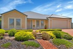  34 Lorikeet Grove Hewett SA 5118 The immaculate street presence and classic yet contemporary façade of this property is sure to pique your interest - and that's before you take in the manicured grounds or step inside. Matt Bunder welcomes you to 34 Lorikeet Grove, Hewett. There's no doubt this beautiful home is in good company in this neighbourhood, where high-calibre properties are the norm. Much larger than it appears from the street, the home has three spacious living areas plus an activity room/study that services the children's bedroom wing. Built in 2009 by Rossdale Homes, the property boasts a carpeted formal living room at the front of the floor plan, opposite the master bedroom wing. Close the door to the family living zone further down the hallway and you'll be able to watch sport or a movie without disturbing other family members, or perhaps enjoy a glass of after-dinner port with your guests. Like many modern properties, the kitchen is definitely the hub of the home, this generous galley-style space has an Omega wall oven, gas cooktop and a Miele dishwasher but the piece de resistance is the large walk-in pantry, where you'll have ample room for all your labelled jars (Marie Kondo style) as well as bulky appliances. The spacious front counter easily accommodates four bar stools for those times when you don't want to sit at the dining table, although the zone for this is a great size and looks out to the covered entertaining area. A big bonus of the open plan family room and equally spacious third living room beyond, is the fact they have striking, neutral floor tiles, which the owner says are an industrial grade. Both the family zone and adjoining living room also have sliding doors out to the entertaining area, which is under the main roofline. Beyond this space, there's yet another covered zone with a striking Apex roofline. So, you will be spoilt for choice when it comes to eating or relaxing alfresco. Talking of being spoilt, there's an in-ground, saltwater heated pool - so if that's on your wish list, you're in luck! And if you enjoy the great outdoors, you're sure to appreciate the wrap around tiered yard, which has been beautifully retained and is complete with hedges. There are also some fruit trees, think: peach, nectarine, lime, orange and mandarin. Back inside and the children's bedroom wing has the benefit of a central, tiled activity room which could be used as a homework zone, a home office or separate living area for a teen, older family member, or guests. Beds 2, 3 and 4 are all a great size and yes, all have built-in-robes. In terms of the location, there's access to the picturesque Robin Circuit Reserve from the street and Osprey Parade Reserve Playground is about 350 metres away. The area is known for its scenic walking trails and the property is opposite North Para River. The local primary school is just over 1km away, while the township of Gawler is under 4kms away. This is a beautifully-considered and carefully executed property offering lots of detail, please see the list below for additional features. ADDITIONALLY: Daikin Ducted reverse cycle air conditioning. Master suite with dual walk-in-robes and ensuite. Big walk-in-pantry. Solar Power. In-ground saltwater, heated pool Outdoor area under the main roofline + adjoining Apex roofline entertaining area. Oversized double garage with single roller door through access. Three living areas plus activity room/study in children's wing. Three-phase power to home, potential to extend this to the shed. Beautifully landscaped grounds. Extensive insulation. Instant gas hot water service. Fruit trees. Land Size: 1036m2 (approximately). Easement: Yes Zone / Subzone: N - Neighbourhood\\ Year Built: 2009 