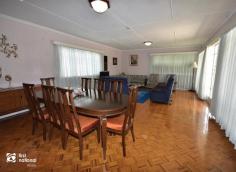  95/97 State Farm Rd Biloela QLD 4715 $380,000 This grand home was impeccably built to impress and has all that it takes to be a showpiece. Like a ‘haute couture’ dress, the good taste and impeccable style of this home is enduring. At the upper-level features include four large bedrooms, all with air conditioning. The master bedroom has a ½ ensuite with shower and vanity. The stunning genuine marble tiled bathroom has a step-in shower, corner bath and double basin vanity plus a separate toilet. Upstairs there is also a lovely sunroom/sitting area that overlooks the front balcony. A timbered panel wall and Silky Oak internal staircase takes you down to the front entranceway and through to the spacious lounge and dining room that has timeless parquetry timber floor. The kitchen is large enough to fit a table and chairs for casual family dining and offers lovely polished Tasmanian Oak timber cupboards plus the quality fixtures and fittings are superb. The laundry is located on the lower level as well along with an office/hobby room, a large rumpus/entertainment room and a shower and toilet. Built at the elevated end of State Farm Road and on a spacious double allotment totalling 1441m2. The design of this home was intended to make maximum use of the large allotments creating a stylish and functional family sanctuary. The exterior of the home offers a double carport, 6x6m approx. shed, garden shed, and beautiful landscaping. There is so much character, potential and vintage admiration to this home, that only an inspection will show you.  
