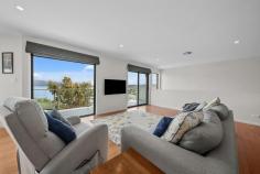  3 Pintoresca Place TRANMERE TAS 7018 $1,295,000 Positioned in a quiet cul-de-sac in an elevated position that enjoys panoramic views over the Derwent River, sits this impressively designed home built in 2017 that is sure to impress. The ground floor provides the main access to the home and features an ample amount of storage, double garage with remote control access, and the laundry. Following the staircase which is fitted with a chair lift, the first floor features a media room which is currently being used as a study. The spacious open-plan living, kitchen and dining area are all light filled and spacious, with an entertainment deck leading off the dining area to soak in those breathtaking views. The kitchen is complete with ample storage space, quality appliances, soft close draws, walk in pantry, as well as a stacker window that opens out to the outdoor alfresco area. Accommodation to the home consists of three spacious and light filled bedrooms and benefiting from those amazing vistas, which are complete with built in robes. The master bedroom benefits from a walk through robe, as well as an ensuite. To complete the inside of the home is ducted reverse cycle heating to keep you comfortable all year round, the family bathroom with both a bath and shower, and a separate toilet complete with it’s own basin for added convenience. Outside you will find a large undercover entertainment area that leads off the kitchen and study/media, creating the perfect space to entertain your family and friends. The backyard is fully enclosed, making It perfect for your children and pets to play in. There is also an ample amount of space with the property having a small garden shed, veggie patch and could have an array of other uses. Being located close to quality schools, several beaches, a few minutes drive to the Shoreline Shopping Centre, this property has everything you need and more.  