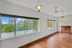  431 Blackall Range Rd West Woombye QLD 4559 Perfectly positioned on the most elevated point of its 6133m2 block to maximise northerly outlook, privacy, natural light, and breezes – is this single level brick home, offering a gentle small-acreage lifestyle amongst the lush, verdant countryside of the lower hills of the Blackall Range. The home itself comprises three bedrooms, one bathroom, separate toilet, combined living and dining plus sunroom, central kitchen, double carport/outdoor entertaining area with built-in BBQ, and separate laundry; there is also a cosy north-east facing balcony off the master bedroom. Whilst a little tired inside with clear potential to update and refresh to suit personal tastes as well as value-add; the home has good bones and is not without charm. Existing features include hardwood floors throughout, decorative fretwork in living/dining doorway, ceiling fans, security screen doors, electric upright oven and stove, and the area immediately around the house is fenced for child and pet-friendly play. In addition, there are 2 x 3-bay sheds on site, one with power – providing extra space for storage, workshop purposes, and parking of vehicles. The soil is rich and fertile – suitable for growing a variety of crops, so could suit hobby farmer, and is low maintenance in its current state, just needing a regular mow/slash. One of the truly appealing things about this property is its position – it is tucked well away from the Blackall Range Road, at the very end of a private laneway at the top of the hill; with very few neighbours it is quiet and peaceful. Whether you purchase the home to live in as is, renovate, or even rebuild – you will not have to worry about overcapitalising; the location is top! Despite its privacy and serenity, it is a pleasant 8-minute drive to the village of Woombye, 12 minutes to Nambour, and 25 minutes to the coast; public and private schools are within a 10-15 minute proximity, and it's only 10 minutes up to Flaxton on top of the Blackall Range. Vacant and ready to move straight into – buyers in the small-acreage market are urged to take a serious look at not just what this is right now, but what it could be. Privately positioned north facing home on 1.5 acres Tucked away on hilltop at end of quiet laneway 3 bedrooms + study + sunroom, 1 bathroom Combined living and dining area Functional kitchen with electric oven & cooktop Double carport/outdoor patio with built-in BBQ Delightful views of the Blackall Range to savour 2 x 3-bay sheds (one powered), fencing around home Potential to renovate/extend or rebuild (stca) Less than 10 mins to village amenities & rail 