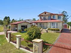  17 Tabratong Road Helensburgh NSW 2508 Nestled in a sought after location and ideally positioned within an easy walking distance to the heart of Helensburgh town centre, transport and parklands this spacious home has been tastefully renovated to provide a wonderful environment for family living and alfresco entertaining. With its sun-drenched aspect and sizable 879sqm parcel of land this home delivers a tasteful neutral colour scheme throughout whilst also providing a selection of family living and entertaining areas. Generously proportioned, this home is the ideal opportunity for the growing or grown family alike. Offering a flexible floor plan, the lower level boasts two generously sized bedrooms with two, near new bathrooms as well as a convenient home office. Showcasing floating floorboards throughout the open plan light filled living and dining areas with air conditioning and combustion fireplace to keep you cool in the summer and cosy in the winter. The stunning kitchen is the hub of the home with the glass doors allowing seamless access to the low maintenance gardens, beautiful in-ground pool and covered alfresco area. The upper level features another two spacious bedrooms with balconies, one with BIR, the master with chic ensuite and walk in robe. Ideal for the handyman or tradie, also offering an oversized double lock up garage with large workshop area, additional carport parking for boats or caravan, loads of storage, and separate self contained accommodation ideal for visiting family and friends or ideal as a teenage retreat. To truly appreciate everything this stunning property has to offer an inspection is a must. 