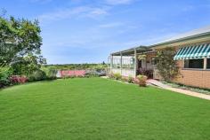  10 MIVA STREET MALENY QLD 4552 Combining an elevated 1014m2 parcel of land with a craftsman-built brick home, this conveniently located Maleny township property with glorious outlook should excite you as you consider the many options available to put your own stamp on it! • Large 1014m2 elevated block with a great North Easterly aspect and expansive views • A very generous floor area with timber kitchen, open lounge dining area and 4 large bedrooms • Covered outdoor entertaining area with views • Huge two-way bathroom along with a second smaller bathroom downstairs • 2.7m high ceilings, oversized rooms throughout; great renovation potential! • Internal access between levels with a staircase as well as a large lift • Massive double garage, workshop room and separate entry with potential to convert to dual living - subject to approval • Oversized laundry/utility room opens straight to the level and private rear yard The opportunity for dual occupancy, work from home, a solid rental property or a family home should all be considered here. To complete the picture, all of the township conveniences are within an easy 2 minute walk. Township properties with an abundance of options such as this are truly rare. 