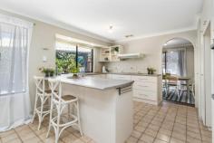  9 Bayley Cl Gosnells WA 6110 $499,000 This stunning home offers a parkland aspect and family living at its very best! Well-established, this amazing home has been designed with perfectly proportioned yet versatile living areas, providing great separation and privacy for each family member with spaces for fun, relaxation, and entertainment. Choose from a range of living zones including a separate lounge and dining room, an immense open plan living area with a large kitchen, plus a plethora of outdoor living ‘rooms’ to enjoy all year round. The sleeping accommodation is in a separate wing from the living, offering four spacious bedrooms. The master bedroom is complete with a wall of robes and its own ensuite. Bedrooms 2, 3, and 4 are all double in size, with all four bedrooms having the tranquil window aspect to the outdoor gardens and parklands, while the main bathroom has a bathtub and a separate WC. The magnificent outdoor grounds offer numerous paved patios and entertaining zones that overlook the backyard grassed area as well as the huge below-ground solar heated pool. If an abundance of storage is a nonnegotiable, the massive powered workshop and shed of over 90m2 will make you one happy homeowner. Additionally, if you’re a boat, caravan, trailer, or large 4wd enthusiast, then this home also offers you room to house the lot in your own backyard, as the side driveway and gate entry allows for super easy reversing. This gorgeous home is located at the end of the cul-de-sac, side on to the glorious Anaconda Drive Reserve, where families with younger children will enjoy endless hours of fun on the open spaces of the surrounding parklands and playgrounds which are sure to delight littlies and adults alike. For garden enthusiasts, the choice of edible trees and plants surrounding the home is endless with such delectables as grapes, lemons, oranges, and bananas, just to name a few. With an overabundance of schools/educational options within walking distance and with shopping and public transport in ample supply, the location of this amazing property is sure to serve your family’s needs for many years to come! This is a premier lifestyle location within a very unique and highly regarded enclave. Inspection really is a must! Features you will love; – Huge 1000m2 block of land – 4 double bedrooms separate from the living areas – Remodeled kitchen – Large shaded backyard – Room for boat, caravan, trailer, and more – Wood burning fire for winter warmth – 2 x bayonet points in both lounge and family – Dual Air conditioning and roof insulation – Alarm, security screens, and window awnings – Solar panels and solar pool heating – Rainwater tank 