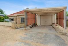  42 LAFFER STREET BARMERA SA 5345 $350,000 Perfectly located in the heart of Barmera, is this character family home that will suit a range of foot prints of buyers. The home boasts four generous sized bedrooms, the master with a BIR, second bedroom with a WIR/study and ceiling fans in bedrooms 1, 3 & 4. A central bathroom with a separate bath and enjoy the convenience of a second toilet via the laundry. To the rear of the home, you will find yourself in a large open plan lounge & dining room that flows through into the tidy kitchen that provides ample bench and storage space. Car parking is off to the side of the home, with 1 x car garage and 1 x car carport as well as a further 1 x car carport to the rear of the property, with access via the rear lane. Further features to enjoy • Split system + ducted evaporative air-conditioning • Linen storage in hallway • Outdoor entertainment area • 3 x garden sheds • 1 x shed with pool pump • Enclosed back yard • Rear lane access 