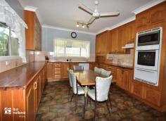  95/97 State Farm Rd Biloela QLD 4715 $380,000 This grand home was impeccably built to impress and has all that it takes to be a showpiece. Like a ‘haute couture’ dress, the good taste and impeccable style of this home is enduring. At the upper-level features include four large bedrooms, all with air conditioning. The master bedroom has a ½ ensuite with shower and vanity. The stunning genuine marble tiled bathroom has a step-in shower, corner bath and double basin vanity plus a separate toilet. Upstairs there is also a lovely sunroom/sitting area that overlooks the front balcony. A timbered panel wall and Silky Oak internal staircase takes you down to the front entranceway and through to the spacious lounge and dining room that has timeless parquetry timber floor. The kitchen is large enough to fit a table and chairs for casual family dining and offers lovely polished Tasmanian Oak timber cupboards plus the quality fixtures and fittings are superb. The laundry is located on the lower level as well along with an office/hobby room, a large rumpus/entertainment room and a shower and toilet. Built at the elevated end of State Farm Road and on a spacious double allotment totalling 1441m2. The design of this home was intended to make maximum use of the large allotments creating a stylish and functional family sanctuary. The exterior of the home offers a double carport, 6x6m approx. shed, garden shed, and beautiful landscaping. There is so much character, potential and vintage admiration to this home, that only an inspection will show you.  