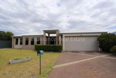  4 Mondrain Avenue Castletown WA 6450 Striking, contemporary 4 bedroom, 2 bathroom home includes study, separate lounge plus superb open family, dining featuring solid Marri timber flooring. Fabulous kitchen overlooks entertaining deck. Dishwasher, massive WI pantry, rev cycle aircon, gas bayonet & powder room. Double garage under main roof and access to rear 6m x 4m c/bond workshop. Well established, reticulated lawns & gardens 
