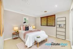  47 Bettington Cct Charnwood ACT 2615 $790,000 This beautiful three bedroom home has been stylishly renovated with contemporary finishes, ready to move straight in and enjoy. The quality renovation features polished hardwood timber flooring, double glazed tinted windows, art deco cornices, stunning external timber doors and an impressive kitchen. Any cook enthusiasts or entertainers will love this space which also flows out onto a private covered deck which can be used all year round. In addition to this, the property has a 5 star energy rating, ducted gas heating and evaporative cooling to keep you comfortable through all seasons. The property is located in a quiet cul de sac with only one adjoining neighbour on a leafy landscaped block of 803 square metres. These gardens wrap around the entire house providing extra privacy and a lush outlook from inside the property. There is lots of parking including a four car garage and four car carport. This location is conveniently positioned within walking distance to the Charnwood Shops, Charnwood Primary School, Fraser Primary School and Fraser Shops. Features: -Renovated three bedroom home -Covered deck and carport with Suntuf SunSmart roof which is hail proof and blocks heat during warmer months -Stylish renovated kitchen featuring lots of storage, island bench, breakfast bar and Ariston freestanding 5 burner cooktop and oven -Polished hardwood timber flooring -Art deco cornices -EER of 5- improved insulation and double glazed tinted windows -Three good size bedrooms, two with built in robes -Renovated bathroom and laundry -Leafy, landscaped gardens -Instant gas hot water system -Evaporative cooling -Ducted gas heating -Colorbond fences, fascias and gutters -Four car garage and four car carport with extra height for larger vehicles -Convenient location, walking distance to schools, shops, playgrounds and public transport 