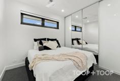  28 Tarakan Ave Broadview SA 5083 $950,000 From the moment you walk in the front door, you are impressed by the naturally light-filled hall, the space and the sheer attention to detail of this home. A welcoming open-plan living and dining space boast a perfect flow and comfort, excellent for entertaining all year round. Complete with reverse cycle ducted air-conditioning and extra downstairs room for a study accompanied by a powder room you'll have everything you need to conduct business without needing to leave the house. This home showcases 2.7m high ceiling upper and lower, providing a sense of grandeur and openness within the home. Designed with functionality, the primary suite is king sized and guaranteed to impress. Other features include rear alfresco, ducted vacuum, Electrolux appliances and a fully irrigated low maintenance rear yard. Features to love: • Custom contemporary kitchen with two steam ovens, induction cooktop with gas point, built-in microwave and integrated dishwasher • Large walk-in robe and double vanity in primary suite • Outdoor kitchen provisions in alfresco with built-in speakers, outdoor blinds and heaters • Large entertaining area • Built-in surround sound speakers • Smart ducted air-conditioning throughout • Ceiling fan to all bedrooms • 15.75kw solar (50 panels) and 10.1kw battery • High 2.7m ceilings throughout • Double glazed windows throughout • Smart gas fireplace • Ducted vacuum • Square set cornices • Led downlights and garden lights • Smart irrigation system • NBN connected • All bedrooms with antenna points • Ubiquiti Unifi network and wireless access points throughout • Ubiquiti security cameras • Smart front and garage door • Security system for extra peace of mind • Zoned for Roma Mitchell Secondary College 