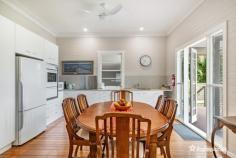  6B Burnet Street Ballina NSW 2478 $895,000 Superbly located in a quiet & sought after part of Ballina with private access off Pool Lane. MacNichol Cottage is handy to both the Richmond River & North Creek and a flat easy walk to shops, cafes & parks. With spacious rooms, high ceilings and polished timber floors, the home is teeming with character and the north facing timber deck provides a great alfresco space. The cottage is wheelchair friendly with ramp access, wide doorways and a fully accessible bathroom. Both bedrooms are en-suited and generous in size adding to the charm of the home. There is side access to store a boat or trailer and a fully fenced yard to keep in your beloved pet. • Well maintained timber cottage • Under 500m to North Creek & the Richmond River • High ceilings and polished timber floors • Covered alfresco area and deck • Air conditioned living/dining area • Fully fenced yard with established gardens • Side access for a boat or trailer • Wheelchair friendly 