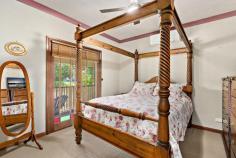  76 Seaham Street Holmesville NSW 2286 $1,190,000 - $1,270,000 It doesn't get much more captivating than arriving at this gorgeous home in wide Seaham Street. Manicured hedges, flowering gardenia, and blooming roses all welcome you inside, but that's just a prelude to the beautiful garden paradise that awaits out back. Built in 1995 in the Federation style, you will feel like you've stepped back in time with a return verandah, ornate fretwork and grand room sizes all a nod to the era. Flowing over a spacious and functional single level, there is plenty of room for a growing family with four robed bedrooms, formal lounge and dining rooms, a large country style bathroom, and a spacious open plan family living area with timber kitchen. Towering shade trees, meticulously manicured hedges and fragrant blooms accentuate the graceful grandeur of this half acre block, with a wide verandah acting as the perfect place to soak up the glorious garden views. A loft above the oversized single garage is an unexpected bonus and is sure to lend itself to many uses, while a double carport and side driveway have all your parking needs covered. Everyone will love the swimming pool and a large flat grassed area at the rear where you can keep chickens or cultivate a veggie garden. You could also add a granny flat for grandparents, older kids saving for their own home, or as extra income, or you could maximise the block's potential and sub divide, subject to council approval. Located just west of Cameron Park, Holmesville is an up-and -coming suburb placed for growth with the M1 and Hunter Expressway nearby for an easy run to Sydney or the Vineyards, and Newcastle CBD only a 25-minute drive. Wander across the street to the kids' playground, or just 350m away find the local café and takeaway shop for a quick bite to eat. Cameron Park Plaza is less than five minutes away where you will find all your day- to-day needs, a gym, and the exciting new Harrigan's Pub, which is currently under construction. - Single level brick and Colorbond roofed home on north facing 2125sqm block - Formal lounge and dining rooms with a/c, ornamental fireplace and access to verandah - Open plan family living with brushbox floors, and a/c flows to an expansive alfresco deck - Blackwood timber kitchen with retro inspired Smeg gas stove, rangehood and dishwasher - Two of the four robed bedrooms open to the wraparound verandah, all with ceiling fans, one with a/c - Full size country style bathroom with bath and shower; extra w/c in garage - Lock-up garage with air conditioned loft retreat/home office, double carport - Beautiful gardens with sheds, secret spots, 3 water features, large flat lawn - 24 Solar electricity panels with potential to add more plus a battery - 3.3km to Barnsley Public School and St. Benedict's Primary, 900m to West Wallsend High, 12km to St Paul's Catholic College 