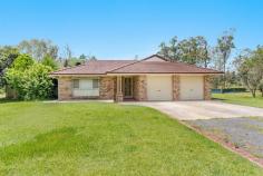  8 Lorikeet Road Gulmarrad NSW 2463 $769,000 This solid 3-bedroom brick and tile home could be the one for you and with a little love could be brought back to life and be a great first home or perfect for retirees. An attractive home set on a lovely acre block in one of Gulmarrad's more established estates. There are three large bedrooms all with built in wardrobes and ceiling fans. The spacious main bathroom is located close to the bedrooms and there is an additional toilet in the laundry which is handy for people using the pool area. Throughout the home there are large windows with lots of natural lighting. The tidy kitchen is centrally located and is open plan with the air-conditioned family room plus overlooks the entertaining area. There is also a good size lounge room to enjoy some quiet time. The outdoor entertaining area is a large space and has direct access to the private in-ground pool area where you are sure to spend many a good time on those hot days. There is a double lock-up garage offering 2 x remote entry and internal access straight into the home plus solar hot water. 