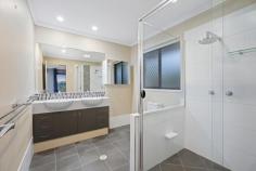  30 Sagitta Place Robina QLD 4226 $1,599,000 Set in a quiet cul-de-sac in the highly sought after Robina estate “The Gallery” is this impressive double storey home boasting a generous functional 37 square floor plan that will provide plenty of room for the entire family. Privacy will not be an issue with living areas both upstairs and down, 5 extra large bedrooms, and the master suite boasting so much space it will make the perfect parents retreat. This property uniquely has dual street frontages with a pedestrian gate onto Lyra Court. Surrounded by beautiful tree lined streets, numerous parks and the Palmer Golf Course, you will be spoiled for choice where to take a leisurely stroll. • Three separate living areas – panoramic hinterland views from the upstairs living • 4 extremely spacious bedrooms upstairs plus a study/5th bedroom downstairs • Two bathrooms plus a separate powder room • Modern open plan kitchen with granite benchtops • Solar heated swimming pool and spa with feature waterfall • Private alfresco entertaining area with built-in BBQ • Ducted air-conditioning throughout, central vacuum system, security system • Double lock-up garaging and additional off-street parking • Quality solar system with 24 panels, 2 gardens sheds • Low maintenance fenced yard with established gardens including fruit trees Conveniently positioned in close proximity to quality schools such as Bond University, Somerset College and All Saints. There are also numerous shopping options available with Robina Town Centre, the Q-Super Centre and Pacific Fair all within a short drive. The hospital, train station and M1 are also easily accessible. 