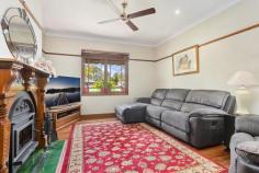  76 Seaham Street Holmesville NSW 2286 $1,190,000 - $1,270,000 It doesn't get much more captivating than arriving at this gorgeous home in wide Seaham Street. Manicured hedges, flowering gardenia, and blooming roses all welcome you inside, but that's just a prelude to the beautiful garden paradise that awaits out back. Built in 1995 in the Federation style, you will feel like you've stepped back in time with a return verandah, ornate fretwork and grand room sizes all a nod to the era. Flowing over a spacious and functional single level, there is plenty of room for a growing family with four robed bedrooms, formal lounge and dining rooms, a large country style bathroom, and a spacious open plan family living area with timber kitchen. Towering shade trees, meticulously manicured hedges and fragrant blooms accentuate the graceful grandeur of this half acre block, with a wide verandah acting as the perfect place to soak up the glorious garden views. A loft above the oversized single garage is an unexpected bonus and is sure to lend itself to many uses, while a double carport and side driveway have all your parking needs covered. Everyone will love the swimming pool and a large flat grassed area at the rear where you can keep chickens or cultivate a veggie garden. You could also add a granny flat for grandparents, older kids saving for their own home, or as extra income, or you could maximise the block's potential and sub divide, subject to council approval. Located just west of Cameron Park, Holmesville is an up-and -coming suburb placed for growth with the M1 and Hunter Expressway nearby for an easy run to Sydney or the Vineyards, and Newcastle CBD only a 25-minute drive. Wander across the street to the kids' playground, or just 350m away find the local café and takeaway shop for a quick bite to eat. Cameron Park Plaza is less than five minutes away where you will find all your day- to-day needs, a gym, and the exciting new Harrigan's Pub, which is currently under construction. - Single level brick and Colorbond roofed home on north facing 2125sqm block - Formal lounge and dining rooms with a/c, ornamental fireplace and access to verandah - Open plan family living with brushbox floors, and a/c flows to an expansive alfresco deck - Blackwood timber kitchen with retro inspired Smeg gas stove, rangehood and dishwasher - Two of the four robed bedrooms open to the wraparound verandah, all with ceiling fans, one with a/c - Full size country style bathroom with bath and shower; extra w/c in garage - Lock-up garage with air conditioned loft retreat/home office, double carport - Beautiful gardens with sheds, secret spots, 3 water features, large flat lawn - 24 Solar electricity panels with potential to add more plus a battery - 3.3km to Barnsley Public School and St. Benedict's Primary, 900m to West Wallsend High, 12km to St Paul's Catholic College 
