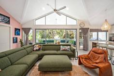  48 Navala Avenue Nelson Bay NSW 2315 $1,350,000 Offering an enviable lifestyle opportunity in one of Nelson Bay's most desirable settings, this substantial two-story entertainer enjoys a premium treescape view and offers dynamic potential. Commanding presence over a 565m2 parcel of land, this one is the ultimate box ticker! This lifestyle property of effortless style and luxury appeal, delivering an unparalleled family lifestyle experience with its premium features and versatile entertaining zones. Radiant and beautifully rendered, crisp white plantation shutters, raked ceilings, sleek timber accents and time honoured proportions deliver exceptional wealth throughout the home. The stunning, well-equipped gourmet entertainers kitchen is perfectly positioned to provide a seamless integration of indoor and outdoor entertaining, whilst remaining a central hub in the heart of the home. Unfolding onto a truly special, covered deck entertaining area designed to entertain year-round and this unique space will become host to many future events and celebrations with family and friends. You fall in love with this space as you appreciate the serene outlook and privacy the treescape offers. Impeccably maintained, the home is comprised of five generously proportioned bedrooms each with ample storage space, a master suite that seconds as a parents retreat with an inbuilt bath in the en-suite and private balcony, study, three spacious living areas with the ability to create the third into a study space or sixth bedroom, three bathrooms and ducted air conditioning. In addition, a separate guest quarters occupies the top level of the home and includes a full kitchenette, bathroom and studio living/bedroom space. Raked ceilings enhance the size of the room and make this a comfortable space for guests, teenagers, family or even as a second source of income. Completely separate, the guest quarters is accessed from the front of the property through a secondary front door. Complete with a low maintenance rear yard and expansive double lock-up garage, this property is a must see! 