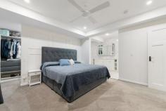  18 Hereford Close KINGSHOLME QLD 4208 Nestled on a secluded 4,968sqm block in the luxurious Montego Hills Estate, surrounded by lush native bushland, lies this grand and opulent 567sqm custom design residence. Built in 2018, this luxurious abode offers ample space and an array of lavish features to cater for every need. As you enter the property, you are greeted by the grandeur of the main entrance, which flows throughout both storeys and culminates with a ceiling that soars to over 4 meters high. The large proportions of the residence are evident in every room, making it perfect for both family living and entertaining guests. The property boasts 6 bedrooms, all with built-in wardrobes/walk-in wardrobes, providing ample storage space. The 2 main bedrooms, one upstairs and one downstairs, are the epitome of luxury and both feature walk-in wardrobes and ensuites, allowing for complete privacy and convenience. The home features 3 bathrooms + a powder room, all with Caesarstone benchtops and Carrara marble features, exuding luxury and opulence as well as 3 separate living areas, each designed to provide the ultimate in comfort and relaxation. The large open plan kitchen, lounge, and dining room features a faux fireplace (gas), perfect for chilly evenings. The media room is designed with acoustic insulation in the walls, providing the perfect space for movie nights with family and friends. The large multi-purpose room or 7th bedroom with built-in cupboards is perfect as a guest room or even a home office. The gourmet kitchen is a chef's dream, equipped with Caesarstone bench tops, a 900mm gas cooktop, electric oven, dishwasher, ducted range hood and Carrara marble splashback. The butler's pantry and study nook are off the kitchen, providing ample space for meal preparation and storage. The separate laundry room also features Caesarstone bench tops and ample storage and cupboards, making laundry a breeze. The property also features a 22,500L in-ground rainwater tank, Krystel Kleer (BioCycle) wastewater treatment system, insulation in all internal and external walls, floor, and ceiling, and acoustic insulation in between storeys. The property is also equipped with security doors and screens, fly screens, ceiling fans, and LED downlights throughout. It has a bottle gas hot water unit and is NBN connected with data points in every room hardwired for internet connection. This residence is truly a masterpiece, seamlessly blending luxury and functionality. With its grand proportions, spacious living areas, and an array of luxurious features, this property is the epitome of luxury living. Features: • 567sqm custom designed residence on a secluded 4,968sqm block • Built in 2018, with grand entrance and high ceilings • 6 bedrooms with walk-in robes and ensuite in main bedrooms • 3 bathrooms (plus a powder room) with Caesarstone benchtops and Carrara marble features • 3 separate living areas and a gourmet kitchen • Double lock-up garage and separate laundry • In-ground rainwater tank, wastewater treatment system and insulation throughout • Security features, LED downlights and Bottle gas hot water unit • NBN connected and data points in every room • 19.61kw Solar System 