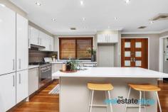  47 Bettington Cct Charnwood ACT 2615 $790,000 This beautiful three bedroom home has been stylishly renovated with contemporary finishes, ready to move straight in and enjoy. The quality renovation features polished hardwood timber flooring, double glazed tinted windows, art deco cornices, stunning external timber doors and an impressive kitchen. Any cook enthusiasts or entertainers will love this space which also flows out onto a private covered deck which can be used all year round. In addition to this, the property has a 5 star energy rating, ducted gas heating and evaporative cooling to keep you comfortable through all seasons. The property is located in a quiet cul de sac with only one adjoining neighbour on a leafy landscaped block of 803 square metres. These gardens wrap around the entire house providing extra privacy and a lush outlook from inside the property. There is lots of parking including a four car garage and four car carport. This location is conveniently positioned within walking distance to the Charnwood Shops, Charnwood Primary School, Fraser Primary School and Fraser Shops. Features: -Renovated three bedroom home -Covered deck and carport with Suntuf SunSmart roof which is hail proof and blocks heat during warmer months -Stylish renovated kitchen featuring lots of storage, island bench, breakfast bar and Ariston freestanding 5 burner cooktop and oven -Polished hardwood timber flooring -Art deco cornices -EER of 5- improved insulation and double glazed tinted windows -Three good size bedrooms, two with built in robes -Renovated bathroom and laundry -Leafy, landscaped gardens -Instant gas hot water system -Evaporative cooling -Ducted gas heating -Colorbond fences, fascias and gutters -Four car garage and four car carport with extra height for larger vehicles -Convenient location, walking distance to schools, shops, playgrounds and public transport 