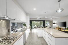  26 Trish Walk Werribee VIC 3030 $750,000 - $810,000 Set in the ever-popular South Side of Werribee, this luxurious Keogh built two-story home is a rare find and certainly makes an ideal family property. As you walk up to the property, you are greeted with a striking façade and low maintenance gardens. Upon entry, you will immediately notice the high ceilings, square set cornices & polished concrete flooring that flows throughout the lower level. Complete with gas hydronic slab heating, the sleek open timber stairwell, light-filled hallway and pendant lighting scattered throughout. Making your way down the hall to the heart of the home is the sensational open plan kitchen offering an abundance of bench and cupboard space, quality European stainless-steel appliances including a 900mm smeg gas cooktop, double Bosch electric oven, warming draw, 40mm stone benchtops, breakfast bar and walk-in pantry. All of this overlooks the spacious open family and meals zone with ceiling fans and split system heating/cooling. Making your way through the stacker door, you'll find an alfresco like no other. Complete with concrete flooring, zip track blinds, heat strips, Bose weatherproof outdoor speakers, Beef Eater built-in BBQ & canopy rangehood, double bar fridge, Decton waterfall solid stone benchtops and not to forget the Polito Woodfired Pizza Oven.. family and friends nights have never been so much fun! Back inside the home and upstairs; you'll find the oversized master bedroom with a walk in robe plus additional cupboard space, plantation shutters, split system and a modern en suite featuring shower niche and stone bench tops. The remaining three bedrooms are generously sized and are serviced by the light & bright modern bathroom. Two of the bedrooms are fit out with walk in robes & have their own split system. This home also features a double car garage with remote & internal access, Bosch alarm system, stone benchtops in all wet areas, four split systems throughout home, established fruit trees, vegetable/herb garden and so much more! In a location second to none and walking tracks directly opposite, parks within a short walk and so close to everything that Werribee has to offer; an abundance of great cafes, restaurants, bars and boutique stores. Local schools such as MacKillop Catholic College, Werribee Secondary College, Werribee Primary School and Corpus Christi Primary School. Inspections are a must to truly appreciate this hidden gem! 
