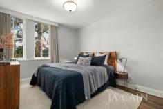  12/6 Balwyn Rd Canterbury VIC 3126 Perfectly positioned deep within one of Canterbury's most exclusive and tightly-held complex's, this stunning ground floor residence has been recently and extensively renovated to produce elegant modern living across a substantial single level floorplan. Sited deep within the block and surrounded by lush greenery, optimal natural sunlight is obtained with the desired north facing aspect and garden vistas from every room. Focusing on quality, the first-class renovation has created open plan living with timber flooring throughout that accompanies the finest of fittings and finishes. Professionally designed kitchen is highlighted through stone benches and splash back, dual granite basins, soft closing drawers, custom lighting and more whilst flowing through to dining area and expansive lounge room which opens onto blue stone paved balcony and courtyard that allows for private alfresco dining and entertaining in a serene setting. Two bedrooms include master with walk in robe and fitted shelving plus built in robes to second bedroom. Award winning bathroom design showcases extensive use of marble and stone with double vanity, floor to ceiling tiles and bespoke shower screen. An additional powder room and separate laundry provide further convenience with added bonuses including ducted heating, huge private storage room and undercover parking. Ultimate convenience is achieved in this location moments from everything Maling Road has to offer plus local specialty shopping, Canterbury train station and Canterbury gardens. Also, in this family-friendly area is the Anniversary trail and some of Melbourne's premier primary and senior schools. 