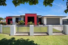  60 GINGHAM STREET GLENELLA QLD 4740 $749,000 Come home to Glenella each day & enjoy a short commute, a location that speaks of superior homes & a family-friendly neighbourhood! Enjoy an executive lifestyle in this modern family home situated on a large corner block in the delightful Northview Gardens Estate in Glenella. This location places you conveniently close to numerous schools, recreational parks, walking/cycling tracks, and shopping facilities, including Bunnings and Northpoint Retail, and only a short drive from major Medical Suites. The large corner block allows entry from two street access points & introduces low-maintenance front gardens, electric gates & a neatly maintained front lawn that leads to an impressive front entrance. From its unique and striking exterior colour palette to the modern, contemporary interior design, this home certainly makes a contemporary statement. The interior design includes a fully tiled, open-plan kitchen/dining/lounge area with a floating island bench for the most social of dinner parties! The brand new ducted reverse cycle air-conditioning maintains a comfortable temperature all year round & supports entertaining out onto the semi-enclosed patio with private pull-down awnings. This alfresco opportunity overlooks an exceptionally populated garden area, thriving with abundant plants, herbs & fruit trees - serve dinner directly from the garden! The entire home has been designed around the sociable entertaining area, which is the central hub, with bedrooms & garages on either side. The well-appointed & efficiently designed kitchen ensures that you are within three steps of the fridge, sink & cooking areas whilst also overlooking the entertaining area, plus utilizing the adjacent large island bench for an extra eating/preparation area with extra storage. The kitchen boasts generously sized cabinets and drawers for storage and a variety of appliances, including a 5-burner gas cooktop, electric oven, and new dishwasher. Left of the central living space is the luxurious master bedroom, featuring its walk-through mirrored wardrobe and oversized ensuite - the entire Master Suite is large, luxurious & private. Bedroom Two is a generously sized queen bedroom complete with sliding glass mirrored built-in robes, tv points & plantation shutters. This end of the house also contains one of the home's two double garages, complete with a concreted driveway. This double garage was once used as a home office & is still equipped with split system air-conditioning, fan & built-in wardrobes. If desiring to repurpose it again, this space could easily convert into an office, rumpus, or very comfortable workshop area. Leading from the right of the main living area, at the opposite end of the home, is the second of the double remote panel lift garage with concreted street entry; the generously sized laundry with good bench space & external access; the family bathroom with stunning black tiled plunge bath & separate shower; separate toilet; Bedrooms Three & Four that are carpeted, built-in, air-conditioned with ceiling fans & plantation shutters. Feel safe & secure in this excellent location, surrounded by high calibre homes, family-friendly neighbours, and fully fenced property with Crimsafe securities & registered keys, all in the quiet, safe suburb of Glenella. Ideal for a growing family, 60 Gingham Street could be the home you've been waiting and hoping for, so don't hesitate to contact Robyn to arrange your inspection. What We Love About Glenella: Safe, Quiet, and Family-friendly: - Easy access to Bruce Highway, Mackay Bucasia Rd, and Mackay Ring Road - Great choice of schools - Beautiful parks for exercise and recreation - Variety of shopping locations 