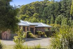  111 Blue Mount Rd Trentham VIC 3458 $1,650,000 Take much desired Blue Mount Road to the edge of the Wombat State Forest, and you will find this light filled, contemporary home loaded with options for its next owner. Set on 4.3 acres of low density residential zoned land mere minutes to the Trentham town centre, this property will provide loads of room for the kids to thrive, offer an opportunity to keep horses or other livestock or perhaps further develop the land holding (subject to STCA). The circular Tuscan stone driveway creates a sense of arrival as you approach this modern recycled brick home, which has been thoughtfully built to enjoy the very best of country living all year round. Enter via the portico double doors to a spacious entry hall, providing glimpses of the forest beyond. A functional floor plan features 3 generous sized bedrooms – the master with ensuite and walk in robe, the further two with BIR's and all featuring quality carpet and stainless steel ceiling fans for comfort. A potential fourth bedroom or work from home office is located at the front of the home. The central bathroom is made for family living and includes a bath, generous shower and heat lamp lighting adjacent to the separate toilet. The busy hub of this home features a gourmet kitchen complete with Smeg and Bosch appliances; and clever use of the large walk in pantry that hides the fridge from view and incorporates plenty of storage. The adjoining dining and living areas are light and bright thanks to large format windows providing green garden views and the vinyl timber floors add contemporary country charm alongside clever use of recycled brick and feature combustion wood heater. This property dials up the entertaining energy with a large rear, covered alfresco area complete with café blinds. Imagine entertaining all your family and friends, with the majestic eucalypts of the forest as your backdrop. There are multiple seating zones, a wall bracket to hook the TV into and a spa! Great memories will be made here. The thoughtful amenity of this property extends to the exterior, with an enormous dam which includes an irrigation pump and taps to water the gardens and livestock, a fully fenced and gated rear garden perfect for keeping kids and pets safe, a large paddock designed for grazing animals – horses, sheep or goats, together with chook enclosure for your feathered friends and complementary shedding for wood or hay. All of this is set amongst low maintenance gardens which include photinia hedging, established maples and native grasses. It is rare to find such a large parcel of land within walking distance to the café culture and retail precinct of Trentham This is the lifestyle property you've been dreaming of - imagine enjoying the solitude and space this property offers without forgoing your first coffee of the day amongst the thriving Trentham community. Trentham is an easy 90 minute drive from Melbourne, located on the Great Dividing Range and only a 15 minute trip to the neighbouring towns of Daylesford, Kyneton and Woodend. Other property features include: - Full double window / door glazing - Ducted evaporative cooling - Reverse cycle split system heating / cooling - Solar boosted gas HWS - High speed fixed wireless connection - Double garage with internal access to the home - Rainwater tanks – 60,000 litres of drinking water 