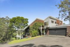  250 Tallebudgera Creek Road Tallebudgera Valley QLD 4228 $2,600,000 Discover a special sanctuary at “Twin Ponds”, where tranquillity prevails amongst 3.9 peaceful and private acres. Set well back from the street, an architecturally designed country chalet rises up from the end of a long tree-lined driveway. Rich with warmth and charm, soaring raked ceilings with exposed rafters complement the timber floors, feature lighting and exposed brickwork, including in the formal lounge and dining zone where a roofline peaks at 5.7m high. Relax here or in the sunken lounge where galleries of glass invite in gorgeous views of the grounds. A modern country kitchen with butler's pantry is another highlight, while four bedrooms and two bathrooms promise cozy comfort. Enticingly, the acreage is equipped with a light, bright second residence for dual living. Comprising two bedrooms, a bathroom, stylish kitchen and open plan living and dining, it's separately metered and is a handy way to offset your mortgage. Outdoors, enjoy an endless summer in the heated resort-style pool and spa, gather around the fire pit to stargaze and share stories, or make the most of the cathedral-style alfresco pavilion, perfect for picnics or outdoor entertaining. Kids will love the flying fox, plus get a taste of sustainability with a thriving orchard and a veggie patch. Horse lovers, you're well catered for too. An equestrian paradise, it boasts two purpose-built stables, a round yard and three paddocks. Two spring-fed dams keep them hydrated, and you'll love being just a few minutes drive from the Tallebudgera Pony Club. Nestled within a natural wonderland, this hinterland haven still offers central convenience. St. Andrew's Lutheran College, Tallebudgera State School and local shops are just four minutes by car, or you can swap the bush for the beach in 12 minutes. So don't miss your chance to embrace an acreage lifestyle and a location you'll love – arrange an inspection today. Main House Features Architecturally designed country chalet, constructed from double brick and cedar wood Soaring raked ceilings with exposed wooden rafters plus feature lighting and timber floors throughout Modern country kitchen with thick stone bench tops, oversized centre island bench, stainless steel appliances including a 5 burner induction cooktop and oven Butler's pantry/laundry with sink, ample storage and access to a private courtyard Sunken lounge room wrapped in high-set glass windows, with feature fireplace and slate floors Formal lounge and dining with gas fireplace and ceilings soaring to 5.7m high, leads onto an expansive outdoor entertaining deck Master suite with exposed brick feature wall, 4.9m raked ceiling, built-in robe and views down to the formal lounge Renovated bathroom with feature brick bathtub, dual head shower, vanity, garden views and a separate toilet Three upstairs bedrooms, including two with built-in robes and one with attic storage Upstairs bathroom with shower/bath, vanity and separate toilet Office Multipurpose room with sink and vanity Foyer/mudroom with barn door Crimsafe screens Air-conditioning and ceiling fans Triple car garage with extra height clearance and a separate double carport Oversized heated resort-style pool, spa and pool cabana Firepit area overlooking picturesque ponds Cathedral-style alfresco pavilion with power and water, perfect for picnics or outdoor entertaining Flying fox for the kids Cottage Features Large kitchen with island bench, stainless steel oven and induction cooktop Spacious and light-filled lounge and dining, with access to a covered outdoor deck Master bedroom with built-in robe and access to a two-way bathroom Bedroom 2 with built-in robe Stylish bathroom with shower, vanity and toilet Laundry with sink, storage and access to a drying courtyard Covered deck Single carport Separately metered Other Features Peaceful and private 3.9 acre estate Set well back from the street and accessed by a long tree-lined driveway with electric gates 13.1kW solar system plus solar hot water Grass round yard Two stables/holding shelters with power and water Three fenced paddocks Town water plus bore water servicing vegetable garden Water tank servicing cottage laundry and toilet and irrigation Two springs fed dams Chicken pens Plethora of bird life Orchard and a veggie patch with storage shed: includes walnuts, star fruit, lemons, limes, mandarins, persimmons and avocados Location Approx. 3 mins to Tallebudgera Pony Club Approx. 4 mins to Tallebudgera State School, local shops and Man on the Bike Pizza Approx. 4 mins to St. Andrew's Lutheran College Approx. 4 mins to Schuster Park and Coplick Family Sports Park Approx. 12 mins to Burleigh Heads Approx. 14 mins to Palm Beach Approx. 35 min to Surfers Paradise 