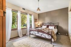  4 Torpy Avenue SNUG TAS 7054 $625,000 - $675,000 Positioned on a large and level 1407m2 block and a leisurely stroll to exquisite esplanade views or the lapping shores of Snug Beach, this 1950’s family home is just waiting for you to unleash the impressive potential on offer. There is much more here than meets the eye so let’s take a look inside. At a generous 161sqm the existing floor plan incorporates a large kitchen, which firmly anchors separate and spacious living areas. A sweet and cosy sunroom is the perfect spot to sip your morning coffee, or step to outdoor living, ideal for gathering with guests as you host celebrations in your new home. Two generously proportioned bedrooms and a bathroom also grace the layout, and outdoors a garden shed and two carports provide vehicle accommodation and storage. Discover existing fruit trees and more on this huge allotment, and the gardener in your family will be able to implement the glorious garden design they have always dreamed of. Presenting versatile options for remodelling and refurbishment, the possibilities are endless with how to embrace this unique offering. Renovate to create your own family sanctuary. Showcase original features, such as the open fireplace, timber doors and architraves to enhance the existing character. Or blend carefully curated improvements to create a showcase of contemporary style. The choice is yours. This is a location to love. Meander alongside the river, or head to the beach for your morning walk. This exceptional location provides the ultimate in convenience too. Walk to local shopping, bus and Snug Primary School, and you’ll find all that is on offer in this beautiful part of the Channel area within easy reach. So don’t hesitate, with only a handful of properties currently on the market in delightful and desirable Snug, this home won’t last long. Call today to arrange your private inspection. • 1950’s family home with enticing potential in fabulous Snug location • 161sqm of living on a large and level 1407m2 block • Ideal for renovation or remodelling • Walk to bus, local shopping and Snug Primary 