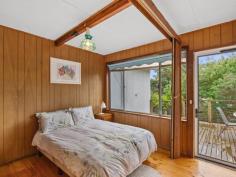  5 Harbour View Sandy Point VIC 3959 $750,000-800,000 Set on approx. 688m2 of land with sheltered rear garden and magnificent tree top height entertaining deck. Much loved by the current owners and now ready for a new family to enjoy. Well maintained both inside and out with easy care external cladding. Living room with wood look gas heater, polished flooring and delightful treed outlook. Retro kitchen with electric stove and breakfast bar to the adjoining meals area. 3 bedrooms, modern family bathroom with laundry facilities. Bore water and tank for drinking water. Under home storage space. Parking for multiple cars. Just 3 minutes walk from beach access and 6 mins stroll to the cafe, general store and tennis courts. Come and discover this picturesque coastal location where the country meets the coastline. 
