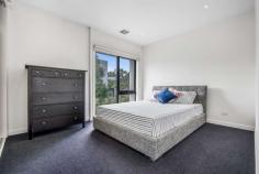  80 Ellsworth Crescent Camberwell VIC 3124 $1,080,000-$1,180,000 This is the ideal opportunity for first home buyers, young families and investors. Positioned just metres from The Crossway Peak walking trail and Lynden Park, and within walking distance to local schools and sporting facilities, this modern double storey townhouse is also just minutes drive from Deakin University. Sporting a stunning contemporary facade featuring raked parapet walls, full render, LED drive lights and rich timber panels, the home is landscaped nicely and includes a paved driveway and lock-up garage. First impressions are appealing, with entry into a spacious living room showcasing luxe timber laminate flooring, high square-set ceilings, LED down lights and an eye-catching full-height timber frame accentuating the L-shaped staircase. The home utilises the natural gradient of the land and steps down to an open-plan layout, with raked ceiling heights increasing beyond 3000mm, creating a wonderful feeling of spaciousness. Heating, cooling and an alarm are all notable inclusions. Outside, a private courtyard awaits, hedged for privacy and adding a paved BBQ area and water tank. There's no compromising on space or quality in the luxurious kitchen, with a walk-in pantry and seamless handle less cabinetry in abundance. 40mm stone bench tops are accentuated by a black glass splashback and elegant gooseneck mixer and sink. Integrated cooking appliances and a stainless steel dishwasher are in excellent condition. The main bathroom is equally luxurious with a tiled hob bathtub and designer sink and tap ware. Atop a delightful timber staircase, three large bedrooms branch off a dedicated sunny study nook and enjoy a plentitude of built-in robe storage. The master suite boasts a make-up nook and private ensuite showcasing full height wall tiles, a mosaic feature tiled wall, oversized frameless shower and mirrored vanity unit. As well as being close to schools, parks, playgrounds and bus routes, the home is also within close proximity to shopping, dining and the prestigious Deakin University. Property Specifications: · Three bedrooms, two open living areas, private courtyard, stunning contemporary facade · Highly appointed bathrooms and kitchen with walk-in pantry · Very high raked ceilings, LED lights, heating, cooling, alarm · Single lock-up garage · Adjacent to walking track and park, close to bus stops, schools and shops · Minutes from university 