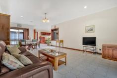  105 Glenlyon Rd Brunswick VIC 3056 $1,050,000 - $1,155,000 So well positioned and occupying a prized 372sqm approx, this solid, brick family home in a high-profile location allows you to leave your car in your very own long driveway or garage and walk to every convenience. Placed 5km from Melbourne's CBD, stroll to Sydney Road and Lygon Street precincts, trams, Brunswick and Jewell stations, Foletta Park and Barkly Square. First time on offer to the market since it was lovingly built in 1987 buyers will love the amenity-rich locale that's close by to Brunswick South Primary School, Princes Hill Primary School, St Margaret Mary's Primary School, Brunswick Secondary College as well as Merri Creek walking trails. Framed by large expanses of glass, sumptuous timber cabinetry, skirtings, door and window frames, the beloved family residence has been wonderfully maintained. A continuous-flow layout boasts three spacious bedrooms comprising built-in robes that share a centrally located bathroom. Bathed in natural white light, the generous kitchen/living/dining zone delivers effortless entertaining. A user-friendly kitchen showcases solid African mahogany cabinetry, abundant bench space, breakfast bar and modern appliances. Relax and unwind from the extended rear patio and pergola that's set against the lowest of low-maintenance gardens. You'll also enjoy the flexibility of a separate courtyard area off the main bedroom that's accessed via the kitchen. Perfect mancave, a 5.3m x 4.1m roller door garage also boasts an adjoining 4.1m x 3.1m kitchenette plus a separate toilet. Other highlights include a spacious laundry with extra linen storage, external security shutters as well as ducted heating and cooling. Ideal for couples, families, professionals and investors, what's not to love? 