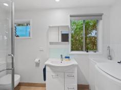  5 Harbour View Sandy Point VIC 3959 $750,000-800,000 Set on approx. 688m2 of land with sheltered rear garden and magnificent tree top height entertaining deck. Much loved by the current owners and now ready for a new family to enjoy. Well maintained both inside and out with easy care external cladding. Living room with wood look gas heater, polished flooring and delightful treed outlook. Retro kitchen with electric stove and breakfast bar to the adjoining meals area. 3 bedrooms, modern family bathroom with laundry facilities. Bore water and tank for drinking water. Under home storage space. Parking for multiple cars. Just 3 minutes walk from beach access and 6 mins stroll to the cafe, general store and tennis courts. Come and discover this picturesque coastal location where the country meets the coastline. 