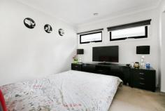  6C Cheddar Rd Reservoir VIC 3073 Live with the luxury of space minus the high-maintenance factor with this family-sized townhouse in the heart of Reservoir! Spanning across two fashionable floors with four spacious bedrooms, two modern bathrooms, high-quality contemporary finishes and indoor-outdoor lifestyle enjoyment, it has all the space you need on a very manageable scale. Warm timber floors flow with style throughout the vast open-plan living domain, overseen by a deluxe kitchen and effortlessly extending onto a private and peaceful backyard ideal for relaxed morning coffees or casual entertaining with friends. Three spacious bedrooms (master with ensuite) are zoned for privacy upstairs, while a fourth bedroom downstairs offers family flexibility. Climate-controlled with split-system heating/cooling, this fantastic first home, smart investment or option for the young family and downsizers also features its own street frontage, high ceilings, plenty of natural light, separate study area, separate laundry, alarm and a single car space. Enhancing your standard of living is the unbeatable lifestyle location, which is within easy walking distance of Broadway and Edwardes Street shops and cafes, Reservoir train station, bus services, schools, Reservoir Leisure Centre and Edwardes Lake Park. 