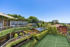  85D Victoria Rd Bellevue Hill NSW 2023 Commanding remarkable north-easterly views across the harbour towards Manly and The Heads, this immense three-level residence is secluded on a significant 2090m2 battleaxe landholding in one of Australia's most salubrious locations. Encompassing a total of seven bedrooms including a separate one-bedroom apartment, it boasts a floodlit tennis court, an indoor pool housed in a conservatory, a multitude of entertaining spaces, indoor lift and an updated self-contained studio above the garage. The grandly proportioned home lends itself to a designer transformation, taking advantage of its sheer size and superb setting just moments to some of Sydney's leading schools. 