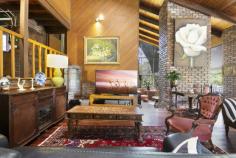  250 Tallebudgera Creek Road Tallebudgera Valley QLD 4228 $2,600,000 Discover a special sanctuary at “Twin Ponds”, where tranquillity prevails amongst 3.9 peaceful and private acres. Set well back from the street, an architecturally designed country chalet rises up from the end of a long tree-lined driveway. Rich with warmth and charm, soaring raked ceilings with exposed rafters complement the timber floors, feature lighting and exposed brickwork, including in the formal lounge and dining zone where a roofline peaks at 5.7m high. Relax here or in the sunken lounge where galleries of glass invite in gorgeous views of the grounds. A modern country kitchen with butler's pantry is another highlight, while four bedrooms and two bathrooms promise cozy comfort. Enticingly, the acreage is equipped with a light, bright second residence for dual living. Comprising two bedrooms, a bathroom, stylish kitchen and open plan living and dining, it's separately metered and is a handy way to offset your mortgage. Outdoors, enjoy an endless summer in the heated resort-style pool and spa, gather around the fire pit to stargaze and share stories, or make the most of the cathedral-style alfresco pavilion, perfect for picnics or outdoor entertaining. Kids will love the flying fox, plus get a taste of sustainability with a thriving orchard and a veggie patch. Horse lovers, you're well catered for too. An equestrian paradise, it boasts two purpose-built stables, a round yard and three paddocks. Two spring-fed dams keep them hydrated, and you'll love being just a few minutes drive from the Tallebudgera Pony Club. Nestled within a natural wonderland, this hinterland haven still offers central convenience. St. Andrew's Lutheran College, Tallebudgera State School and local shops are just four minutes by car, or you can swap the bush for the beach in 12 minutes. So don't miss your chance to embrace an acreage lifestyle and a location you'll love – arrange an inspection today. Main House Features Architecturally designed country chalet, constructed from double brick and cedar wood Soaring raked ceilings with exposed wooden rafters plus feature lighting and timber floors throughout Modern country kitchen with thick stone bench tops, oversized centre island bench, stainless steel appliances including a 5 burner induction cooktop and oven Butler's pantry/laundry with sink, ample storage and access to a private courtyard Sunken lounge room wrapped in high-set glass windows, with feature fireplace and slate floors Formal lounge and dining with gas fireplace and ceilings soaring to 5.7m high, leads onto an expansive outdoor entertaining deck Master suite with exposed brick feature wall, 4.9m raked ceiling, built-in robe and views down to the formal lounge Renovated bathroom with feature brick bathtub, dual head shower, vanity, garden views and a separate toilet Three upstairs bedrooms, including two with built-in robes and one with attic storage Upstairs bathroom with shower/bath, vanity and separate toilet Office Multipurpose room with sink and vanity Foyer/mudroom with barn door Crimsafe screens Air-conditioning and ceiling fans Triple car garage with extra height clearance and a separate double carport Oversized heated resort-style pool, spa and pool cabana Firepit area overlooking picturesque ponds Cathedral-style alfresco pavilion with power and water, perfect for picnics or outdoor entertaining Flying fox for the kids Cottage Features Large kitchen with island bench, stainless steel oven and induction cooktop Spacious and light-filled lounge and dining, with access to a covered outdoor deck Master bedroom with built-in robe and access to a two-way bathroom Bedroom 2 with built-in robe Stylish bathroom with shower, vanity and toilet Laundry with sink, storage and access to a drying courtyard Covered deck Single carport Separately metered Other Features Peaceful and private 3.9 acre estate Set well back from the street and accessed by a long tree-lined driveway with electric gates 13.1kW solar system plus solar hot water Grass round yard Two stables/holding shelters with power and water Three fenced paddocks Town water plus bore water servicing vegetable garden Water tank servicing cottage laundry and toilet and irrigation Two springs fed dams Chicken pens Plethora of bird life Orchard and a veggie patch with storage shed: includes walnuts, star fruit, lemons, limes, mandarins, persimmons and avocados Location Approx. 3 mins to Tallebudgera Pony Club Approx. 4 mins to Tallebudgera State School, local shops and Man on the Bike Pizza Approx. 4 mins to St. Andrew's Lutheran College Approx. 4 mins to Schuster Park and Coplick Family Sports Park Approx. 12 mins to Burleigh Heads Approx. 14 mins to Palm Beach Approx. 35 min to Surfers Paradise 
