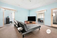  1 / 200 John Street Maryborough QLD 4650 $235,000 What a great way to get into the rental investment market, or perhaps a suitable budget first home or project. Centrally located to the CBD, schools and shops, this very generously proportioned Queenslander has a lot to offer. Featuring two bedrooms plus large sleepout, open plan living comprising defined lounge and dining areas, timber VJ walls and timber fretwork. Separate kitchen with plenty of cupboards, bathroom with shower over bath, toilet is separate and laundry underneath. There is a concrete drive to the single carport outback, plus off-street parking bay out front and loads of space under the house. The property is currently tenanted to March 2023 at $300 per week. While this property is part of a Community Title, there are no body corporate fees, and the driveway is shared only with the property at the rear. 