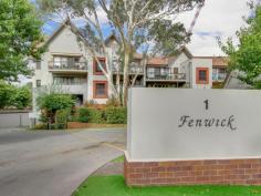  10/1 Eldridge Cres Garran ACT 2605 $669,000 Stylish executive style first floor apartment (only one set of steps from front entry). Superbly presented with awesome outlook from the large front entertainment sized balcony. Brand new kitchen adds to the enormous appeal of this spacious apartment. 2 bedrooms, en-suite, walk in wardrobe plus second bathroom with bath/spa. Designated dining/family room separated from the living room by paneled walls. Rear balcony off bedroom 1, 3 wall air conditioners, in slab floor heating, carpets and quality curtains, single garage with auto door plus one allotted car space. The Fenwick complex together with the others in the development are enhanced by the picturesque gardens and enormous green space. Only minutes to the Canberra Hospital, the highly sought after Garran Primary School , the vibrant Garran Shopping Centre , which is complete with a Medical Centre. Features, * 2 bedrooms en-suite * Walk in wardrobe and built in robes with sliding doors * Brand new kitchen with d/washer and a high bench * In slab floor heating * Reverse cycle heating/cooling units in living room and bedrooms 1 & 2 * Dining/family room * Living room opens out to a large entertainment sized balcony * High ceilings with recessed lighting * Ceiling fans in living room and main bedroom * Quality carpets and curtains throughout * Bathroom has bath/spa and w/c * Balcony at rear off bedroom 1 * Neutral colour scheme throughout * Garage with auto door plus allotted car space * Beautiful colourful gardens and grounds surround this complex 