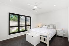  1 Park St Glandore SA 5037 $900,000 to $960,000 Brand new in 2022, this barely-lived-in courtyard is 466sqms (approx.) of total contemporary class. Tucked privately at the rear of a hammerhead block down a long driveway, parents can enjoy peace of mind being set back from the road, and will be even more impressed with the floorplan. A generous second living space upon entry has bedrooms two and three coming off it, and would make a fabulous kids' play space with room for the home office, with access to the main bathroom with big bath, semi frameless shower and separate w/c. Down the hallway the sleekest of open plan setup awaits; an eye-catching kitchen overlooking a flexible family and dining space with sliding doors onto the alfresco. A deep blue island and cupboards are complemented perfectly by white solid bench tops and overhead cabinetry along with a cheerful blue tiled splash back. Gas cooking, a dishwasher, double sink, breakfast bar and pendant lighting along with an enormous butler's pantry complete the picture. Outdoor entertaining takes the form of a paved courtyard space under the protection of the main roof, with small lawn and gravel areas on either side. A delightful parent's retreat or master bedroom overlooking the backyard is privately positioned in its own wing at the rear with a walk-through robe and ensuite bathroom. Delight in the details: - Ducted reverse cycle air conditioning & ceiling fans throughout - Plantation shutters - Double Glazing in Main Bedroom - Separate laundry - Provision to add remote control gate at the street. - Double garage with internal & side access + off-street parking - Within the Adelaide High & Adelaide Botanic High Schools Zone again for 2024 enrolments Walk to Jubilee Park, Kurralta Park Shopping Centre and bus and tram transport, with the Weigall Oval Reserve, Black Forest Primary School and train within easy reach. Central to city and sea. Sure to be a favourite with families or a solid investment in an ever-popular City fringe suburb. Don't miss it. 