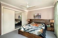  3 Ebony Way Biloela QLD 4715 $450,000 If size and location are high on your priority list, then this property in a sought after and popular family friendly neighbourhood, should be at the very top of your "inspect today" list. This low set home with a stylish façade is family sized living from front to back. The open plan, living and dining area provides access to the enormous undercover, alfresco area which is bound to become an entertainer's delight. A quiet, private and weather proof retreat to be enjoyed by all. A near new kitchen is positioned so that all living areas are within view. There's an island bench and the sheer functionality of ample storage. A pleasing colour pallet completes the look. There's a separate space adjoining the living room which would lend itself perfectly to a craft room or even a separate sitting room. The property boasts 4 above average sized bedrooms situated away from the main living area. All have fans, air-conditioning and built-in robes. The master bedroom of course, with ensuite and walk-in robe. Side by side car spaces in a lockable garage with drive through access to the back yard and the 6m x 6m* powered shed. For anyone who fancies themselves as a bit of a musician, there's even a built-in, sound-proof music room to keep you entertained and your neighbours happy. 