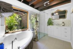  250 Tallebudgera Creek Road Tallebudgera Valley QLD 4228 $2,600,000 Discover a special sanctuary at “Twin Ponds”, where tranquillity prevails amongst 3.9 peaceful and private acres. Set well back from the street, an architecturally designed country chalet rises up from the end of a long tree-lined driveway. Rich with warmth and charm, soaring raked ceilings with exposed rafters complement the timber floors, feature lighting and exposed brickwork, including in the formal lounge and dining zone where a roofline peaks at 5.7m high. Relax here or in the sunken lounge where galleries of glass invite in gorgeous views of the grounds. A modern country kitchen with butler's pantry is another highlight, while four bedrooms and two bathrooms promise cozy comfort. Enticingly, the acreage is equipped with a light, bright second residence for dual living. Comprising two bedrooms, a bathroom, stylish kitchen and open plan living and dining, it's separately metered and is a handy way to offset your mortgage. Outdoors, enjoy an endless summer in the heated resort-style pool and spa, gather around the fire pit to stargaze and share stories, or make the most of the cathedral-style alfresco pavilion, perfect for picnics or outdoor entertaining. Kids will love the flying fox, plus get a taste of sustainability with a thriving orchard and a veggie patch. Horse lovers, you're well catered for too. An equestrian paradise, it boasts two purpose-built stables, a round yard and three paddocks. Two spring-fed dams keep them hydrated, and you'll love being just a few minutes drive from the Tallebudgera Pony Club. Nestled within a natural wonderland, this hinterland haven still offers central convenience. St. Andrew's Lutheran College, Tallebudgera State School and local shops are just four minutes by car, or you can swap the bush for the beach in 12 minutes. So don't miss your chance to embrace an acreage lifestyle and a location you'll love – arrange an inspection today. Main House Features Architecturally designed country chalet, constructed from double brick and cedar wood Soaring raked ceilings with exposed wooden rafters plus feature lighting and timber floors throughout Modern country kitchen with thick stone bench tops, oversized centre island bench, stainless steel appliances including a 5 burner induction cooktop and oven Butler's pantry/laundry with sink, ample storage and access to a private courtyard Sunken lounge room wrapped in high-set glass windows, with feature fireplace and slate floors Formal lounge and dining with gas fireplace and ceilings soaring to 5.7m high, leads onto an expansive outdoor entertaining deck Master suite with exposed brick feature wall, 4.9m raked ceiling, built-in robe and views down to the formal lounge Renovated bathroom with feature brick bathtub, dual head shower, vanity, garden views and a separate toilet Three upstairs bedrooms, including two with built-in robes and one with attic storage Upstairs bathroom with shower/bath, vanity and separate toilet Office Multipurpose room with sink and vanity Foyer/mudroom with barn door Crimsafe screens Air-conditioning and ceiling fans Triple car garage with extra height clearance and a separate double carport Oversized heated resort-style pool, spa and pool cabana Firepit area overlooking picturesque ponds Cathedral-style alfresco pavilion with power and water, perfect for picnics or outdoor entertaining Flying fox for the kids Cottage Features Large kitchen with island bench, stainless steel oven and induction cooktop Spacious and light-filled lounge and dining, with access to a covered outdoor deck Master bedroom with built-in robe and access to a two-way bathroom Bedroom 2 with built-in robe Stylish bathroom with shower, vanity and toilet Laundry with sink, storage and access to a drying courtyard Covered deck Single carport Separately metered Other Features Peaceful and private 3.9 acre estate Set well back from the street and accessed by a long tree-lined driveway with electric gates 13.1kW solar system plus solar hot water Grass round yard Two stables/holding shelters with power and water Three fenced paddocks Town water plus bore water servicing vegetable garden Water tank servicing cottage laundry and toilet and irrigation Two springs fed dams Chicken pens Plethora of bird life Orchard and a veggie patch with storage shed: includes walnuts, star fruit, lemons, limes, mandarins, persimmons and avocados Location Approx. 3 mins to Tallebudgera Pony Club Approx. 4 mins to Tallebudgera State School, local shops and Man on the Bike Pizza Approx. 4 mins to St. Andrew's Lutheran College Approx. 4 mins to Schuster Park and Coplick Family Sports Park Approx. 12 mins to Burleigh Heads Approx. 14 mins to Palm Beach Approx. 35 min to Surfers Paradise 