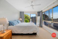  18 Ramornie Drive Toormina NSW 2452 $869,000 - $899,000 In an elevated position with a perfect North East aspect is this impressive 3 bedroom home. Capturing cooling sea breezes and with a wonderful outlook this home will surprise you. From the moment that you enter through the front door and are met with stunning polished timber floors you immediately realise that this home is not your average 3 bedder. The raked ceilings in the living area give a great sense of space and lots of windows provide ample natural light. The 3 bedrooms are all a great size and there is also the bonus of a large office with 2 built in work stations. The generous main bathroom features mosaic tile highlights. The ensuite is also finished to a high standard and is larger than most main bathrooms. The central kitchen is great for the entertainer and provides the chef with an opportunity to interact with people whether they are seated at the dining table, on the deck or in the living room. There are a multitude of options for outdoor entertaining, with a large deck leading off the living area and a second deck off the dining area. Both have a pleasant outlook over the beautiful tropical gardens and out toward Sawtell on the horizon. The gardens are immaculately maintained and there is enough room for a vegie patch with easy access to the yard from the drive through double garage. There is also a dedicated parking space for a boat or caravan. Convenience is also a massive selling feature with a major shopping centre only a stone's throw away, schools within walking distance and the beautiful beaches,cafes and restaurants of Sawtell within approximately a 5 minute drive. If you've been searching for an above average home with a unique design then this home is for you. 