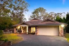  20-34 Honeyeater Dr Greenbank QLD 4124 This contemporary brick and tile lowset home is proudly nestled on a sprawling 1.26Ha block in a picturesque pocket of Greenbank and is the epitome of peaceful and tranquil living, nestled amidst the breathtaking natural surrounds of the area. Clean, architectural lines dominate the internal aesthetics of this beautiful home. You will immediately be struck by the spacious and open layout of the home. The living areas are divided into two separate zones, providing ample space for relaxation and entertaining. The formal lounge greets you upon entry and showcases a cosy fireplace, perfect for those cooler winter evenings. The separate family room provides the cooler comfort of air-conditioned living. Both living areas are filled with natural light and a sense of warmth and comfort. Central to the home is the beautifully appointed gourmet kitchen which showcases expansive benchtop space, premium stainless steel cooking appliances and an abundance of cupboard and pantry storage, making it the perfect space for those who love to cook and entertain. What better way to entertain than in the stunning outdoor alfresco area, complete with beautiful timber decking, which offers the perfect spot for relaxing and taking in the beautiful natural surrounds. You will instantly be transported to a serene oasis with a lap pool on one side and a lovely, grassed pocket where the kids and pets can roam free. This grassed area features a timber walkway, surrounded by stunning bamboo trees, that leads to a covered gazebo area, perfect for relaxing and provides a refreshing retreat from the sun, creating a serene and tranquil atmosphere. Back inside, 4 spacious bedrooms are on offer, all with built in robes and ceiling fans. The master suite is an inviting space which features a large walk-in robe and a luxurious ensuite complete with a corner bathtub, perfect for decompressing. The main bathroom services the remaining bedrooms and is equally as impressive in style and function. Other features of this property include a huge, solar American-style barn shed, complete with workshop and living quarters, perfect as a teenager's retreat. It also features a double remote garage, beautiful pockets of lush landscaping, a number of large-capacity rainwater tanks and extravagant landscaping and trees strewn across the property. This exceptional property is truly a nature lover's paradise, offering the ultimate retreat from the hustle and bustle of city life. It is located within close proximity to a plethora of schools, shops, medical and recreational facilities, transport and close access to major arterials. Greenbank is easily accessible, with the Logan Motorway to the north, the Centenary Highway to the west and the Mount Lindesay Highway to the east. The Greenbank Park "n" Ride bus interchange is the suburb's major public transport hub which is serviced by a number of Translink bus routes. Come and experience the tranquillity and beauty of this stunning acreage home for yourself. Property features and inclusions: - Contemporary brick and tile lowset home - Nestled on a 1.26 hectares - Built in 2005 - Floor plan size approx 250m2 - 4 bedrooms, all with built in robes and fans - Master boasts WIR, ensuite and aircon - Formal lounge with fireplace and - Airconditioned family room with dining - Gourmet kitchen with ample bench and storage space - Contemporary family bathroom - Separate internal laundry - Air conditioning - Recessed lighting - Ceiling fans - Fireplace - 7m x 5m outdoor entertaining area - Sparkling inground lap pool - Large gazebo for entertaining - Timber deck overlooking bushland - Multiple large-capacity rainwater tanks - Double remote garage - Solar powered 10m x 12m shed featuring: - Mezzanine floor - Power and lighting - Plumbing inc toilet - Kitchenette - Asphalt driveway from entry gates to the garage - Fully fenced - Council rates $550/qtr This property is being sold by auction or without a price, and therefore, a price guide cannot be provided. The website may have filtered the property into a price bracket for website functionality purposes. 