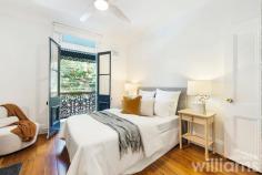  51 Australia St Camperdown NSW 2050 With its leafy park side location, abundance of great eateries, and easy transport options this charming three-bedroom terrace delivers a fantastic inner-city lifestyle. Beautifully presented, the stylish interiors blend thoughtful upgrades with pristine heritage features to create a warm and welcoming home. Providing plenty of space for young professionals and growing families alike, the generous lower level includes lounge, separate dining area, and stunning designer kitchen. While the bright and sunny upper level has two guest bedrooms, plus master with an ornate balcony that overlooks Camperdown Park. Entertain friends and family, or simply relax, in the private and spacious courtyard framed by established greenery. A convenient Camperdown location means vibrant King St, Newtown train station, CBD buses, and local parks are all within a 1km radius. • Delightful heritage three-bedroom home in a prized end-of-terrace position • Light-filled layout with separate lounge and dining rooms, both with original fireplaces • Sleek and modern kitchen featuring self-cleaning electric oven, Bosch dishwasher • Cleverly concealed laundry with room for washing machine and separate dryer • Large designer bathroom with deep bath and combined waterfall shower • Two bright and sunny guest bedrooms, one with built-in robe and storage • Large master bedroom featuring original fireplace, built-in robe, and private balcony • Timber flooring throughout. Ceiling fans. Period features. Security grills • Large courtyard accessible from kitchen. Rear lane access and parking. 