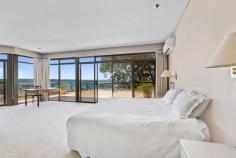  85D Victoria Rd Bellevue Hill NSW 2023 Commanding remarkable north-easterly views across the harbour towards Manly and The Heads, this immense three-level residence is secluded on a significant 2090m2 battleaxe landholding in one of Australia's most salubrious locations. Encompassing a total of seven bedrooms including a separate one-bedroom apartment, it boasts a floodlit tennis court, an indoor pool housed in a conservatory, a multitude of entertaining spaces, indoor lift and an updated self-contained studio above the garage. The grandly proportioned home lends itself to a designer transformation, taking advantage of its sheer size and superb setting just moments to some of Sydney's leading schools. 