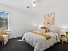  7/2 - 6 Margaret Street NORWOOD SA 5067 $850,000 - $870,000 Perfectly located two story townhouse with cosmopolitan The Parade right on your doorstep, offering an array of cafes, restaurants, and shopping and only minutes from the CBD. Offering three spacious bedrooms, main with a wall of built-in robes, the two additional bedrooms, one with built-in and access to balcony where you can enjoy your morning coffee, provide flexible space for a couple or young family. Modern bathroom with separate shower and full sized bath, vanity and separate second toilet. Lower level comprises well-appointed kitchen with dishwasher, modern appliances, plenty of cupboard space with an open living family/dining area. Outlook to the paved alfresco area provides extra space for entertaining and overlooks the low maintenance garden. Separate laundry with downstairs 2nd toilet. Under stair storage room. Enjoy year round comfort from zoned ducted air conditioning. Single car garage with remote roller door and secure gated access to group from Margaret Street & Queen Street. Rare opportunity for the investor or home owner to secure this delightful townhouse in such a desirable location. Features include : • Two story townhouse • Three bedrooms, 2 with built-in robes • One bedroom with balcony • Modern bathroom with separate shower & bath • Open living family / dining area • Kitchen with modern appliances • Separate laundry & 2nd toilet • Outdoor paved alfresco area • Single car carport with remote roller door 